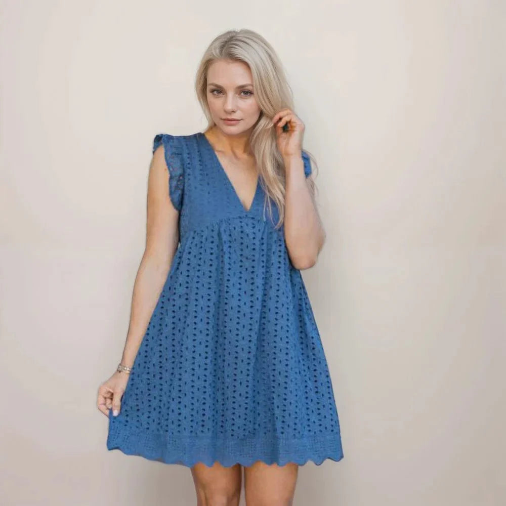 Summer dress with pockets and built-in shorts.